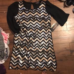 Girls dress size 14 new with tags